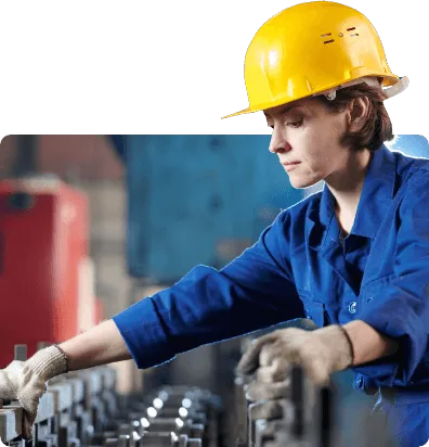 female manufacturing worker in high vis and hard hat