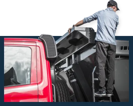 Truck Driver checking on his load