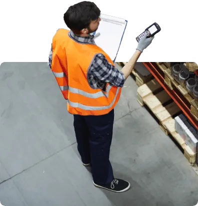 Stareman scanning boxes holding a clipboard