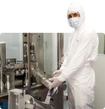 Pharmaceutical machine operator packing products into a bag